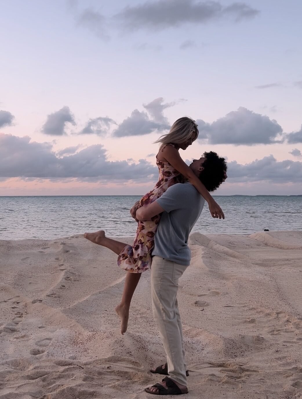 happy married couple at a beach in love